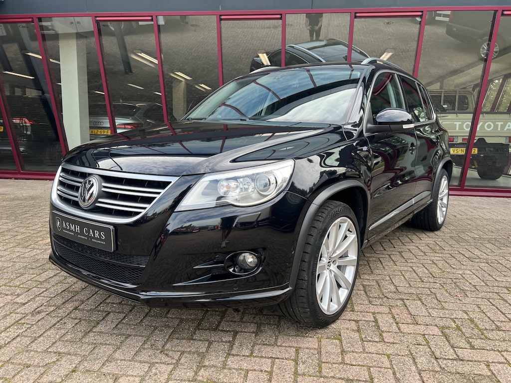 Volkswagen Tiguan 1.4 TSI Sport&Style | R-line | Pano | Trekhaak | Airco | PDC | Navi |