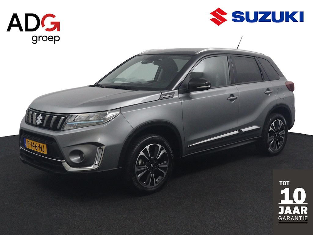 Suzuki Vitara 1.4 Boosterjet Style Smart Hybrid | Trekhaak | Kunstlederen Bekleding | Parkeersensoren | Keyless Entry | Dodehoek Detectie |