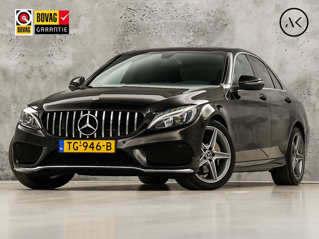 Mercedes-Benz C-klasse 180 AMG Sport 156Pk Automaat (NAVIGATIE, CAMERA, LEDER, ZWART HEMEL, STOELVERWARMING, SPORTSTOELEN, GETINT GLAS, NIEUWSTAAT)