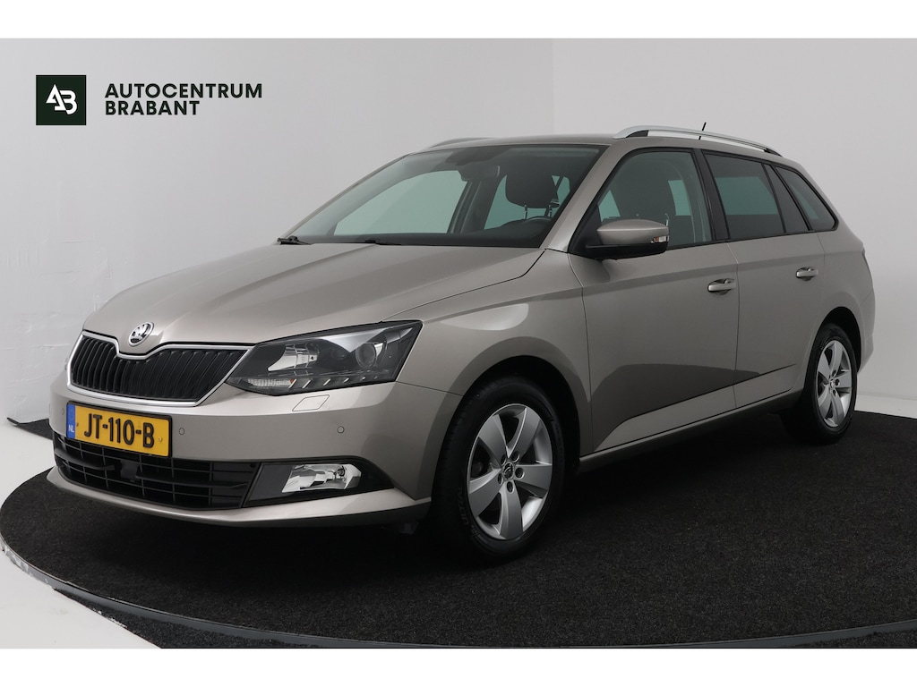 Skoda Fabia Combi 1.2 TSI Style Business (TREKHAAK, STOELVERWARMING, NAVIGATIE)