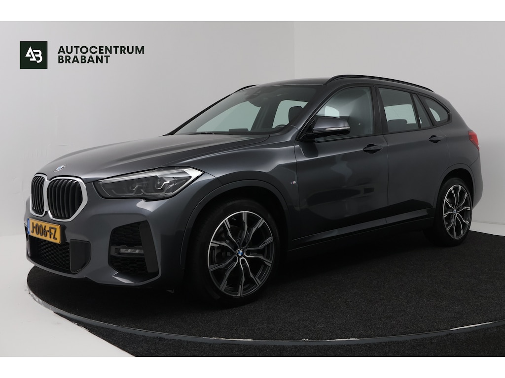 BMW X1 sDrive18i High Executive (SFEERVERLICHTING, NAVIGATIE, CRUISE CONTROL, DEALER ONDERHOUDEN)