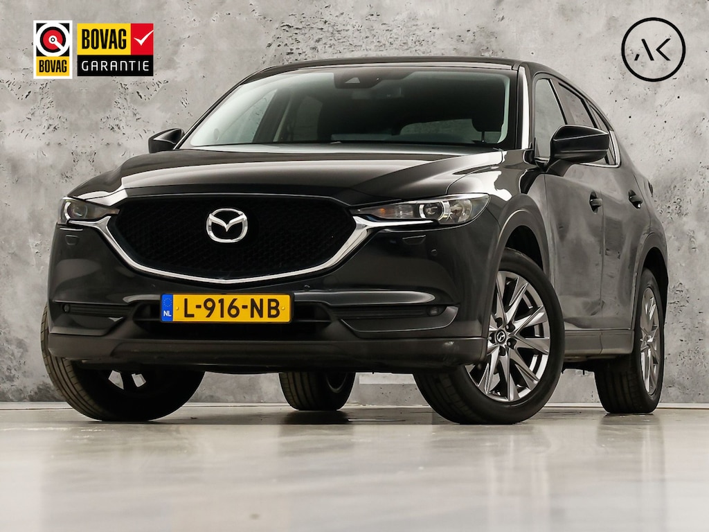 Mazda CX-5 2.0 SkyActiv-G 165 Luxury Sport 165Pk Automaat (APPLE CARPLAY, GROOT NAVI, STUUR/STOELVERWARMING, GETINT GLAS, SPORTSTOELEN, KEYLESS, TREKHAAK, LANE ASSIST, LED KOPLAMPEN, NIEUWSTAAT)