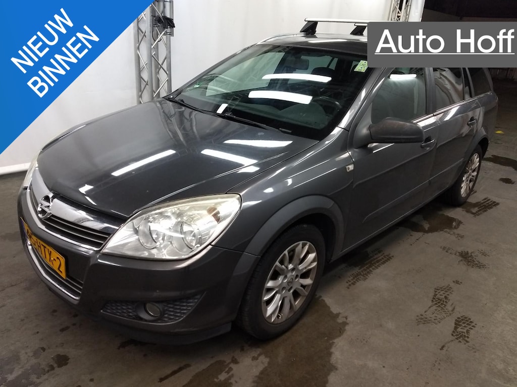 Opel Astra Wagon 1.4 Business | Navi | Airco | Cruise Control | LMV | PDC | Trekhaak | Privacy Glass | APK tot 02-03-2027!