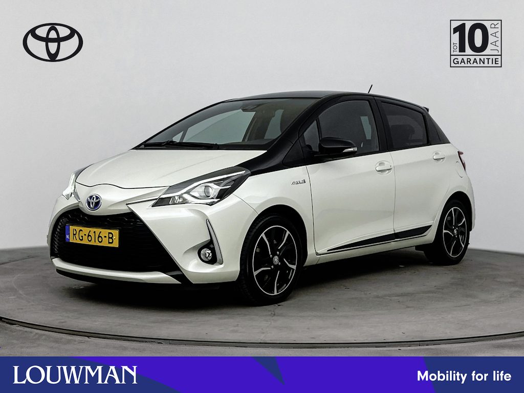 Toyota Yaris 1.5 Hybrid Bi-Tone | Lichtmetalen Velgen | Mistlampen | Cruise Control + Climate Control | Elektrische Ramen + Spiegels |