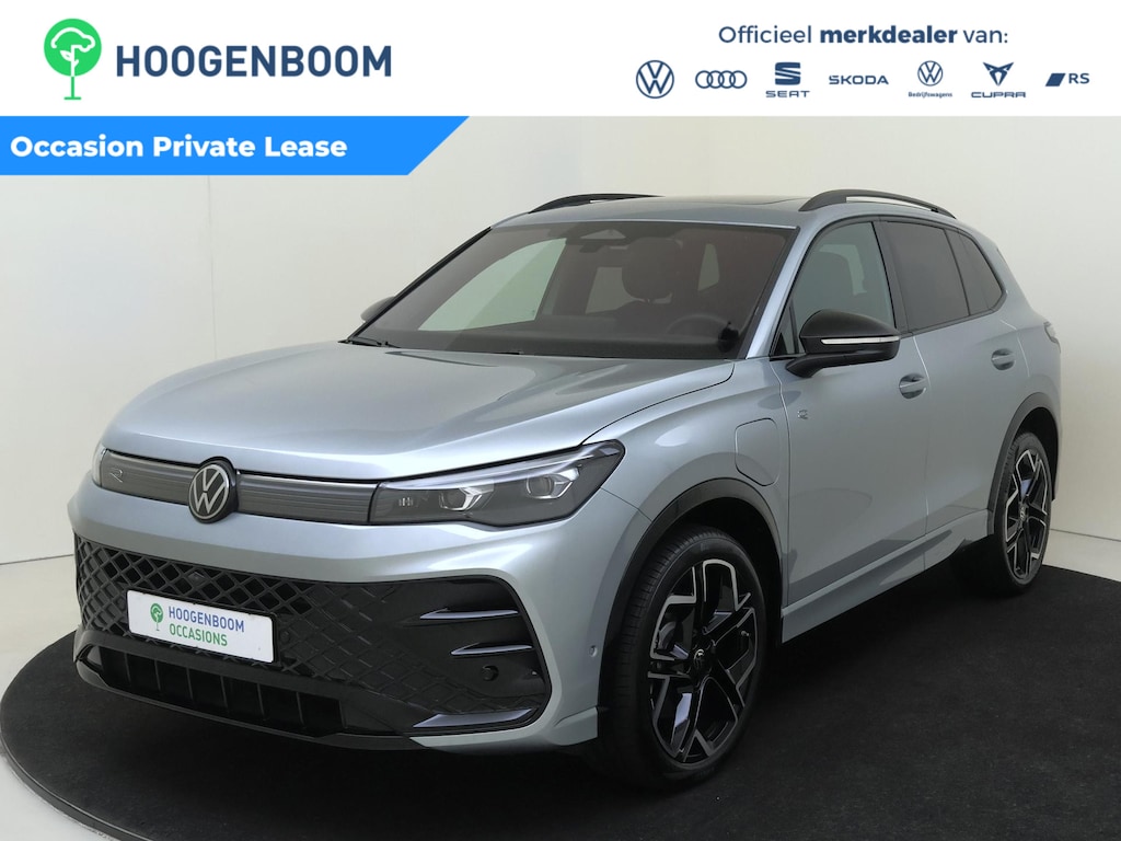 Volkswagen Tiguan 1.5 eHybrid R-Line Edition | SoH 99% | Panoramadak | Trekhaak | Lederen bekleding met ventilatie ‘Varenna’ | Adaptieve demping | Head-up display | Harman/Kardon | Stoel- en stuurwielverwarming | Sfeerverlichting |