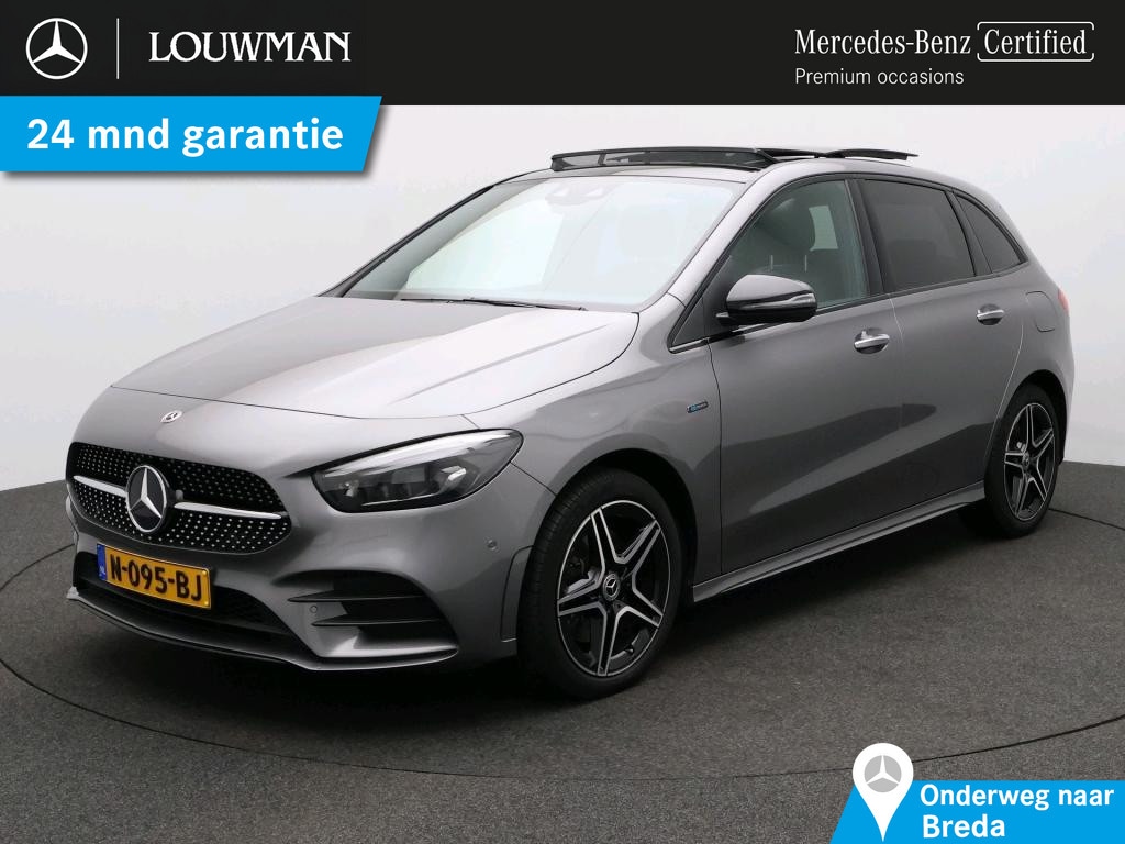 Mercedes-Benz B-klasse 250 e Business Solution AMG Limited Trekhaak | AMG Line | Night Pakket | Memory Stoelen | Panorama Schuifkanteldak | Sfeerverlichting. Inclusief 24 maanden MB Certified garantie voor Europa.