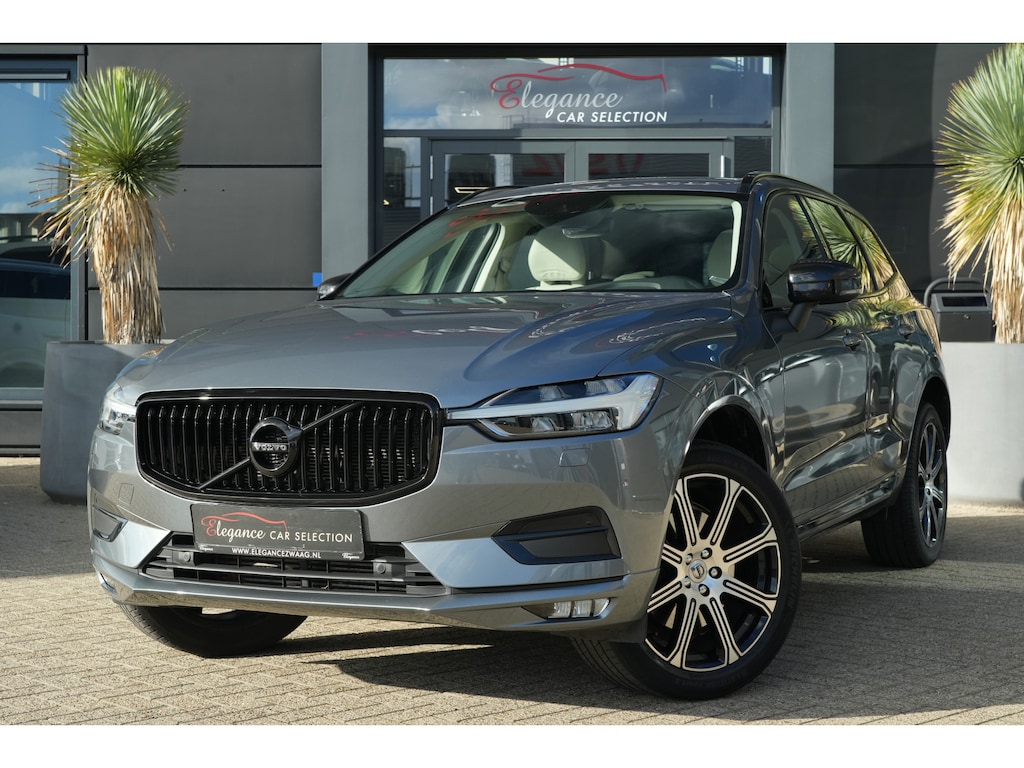 Volvo XC60 2.0 T6 AWD Inscription | 310 PK | Panoramadak | Lederen bekleding | Luchtvering | Trekhaak | Volvo XC60 2.0 T6 AWD Inscription 310 PK met 2.0-liter 4-cilinder benzinemotor, panoramadak, luxe lederen bekleding, elektrisch verstelbare en verwarmde voorstoelen, 12,3" digitaal instrument