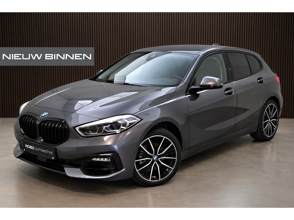 BMW 1-Serie 118i Executive Edition Sportline | Cruise Contol | Ambiance Verlichting | Navigatie | Keyless | Parkeersensoren | Climate Control | LED | BTW