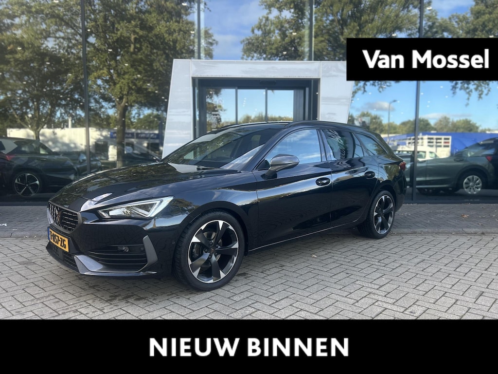 CUPRA Leon Sportstourer 1.5 eTSI Business Edition Plus | TREKHAAK | STUURVERWARMING | STOELVERWARMING | NAVIGATIE | SFEERVERLICHTING | ELEKTRISCHE ACHTERKLEP | APPLE CARPLAY - ANDROID AUTO |
