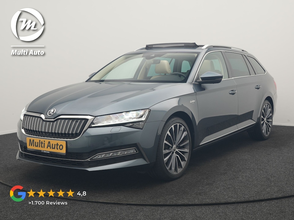 Skoda Superb Combi 1.4 TSI iV Laurin & Klement PHEV 218pk Dealer O.H. | Trekhaak Af Fabriek | Panodak | Adaptive Cruise | 360 Camera | Canton Audio | Lederen Comfortstoelen Massage & Ventilatie & Memory | Crystal LED | Stoelen & Stuur Verwarmd | Keyless | Blis | Plug In Hybrid |