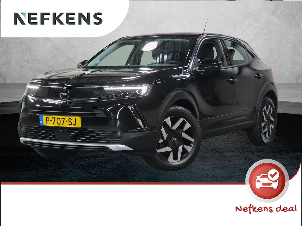 Opel Mokka 100PK Elegance | 1ste eigenaar | AppleCarPlay/AndroidAuto | Camera | Climate Control | Cruise Control | Armsteun | Keyless | 17"LMV | LED lampen | Isofix |