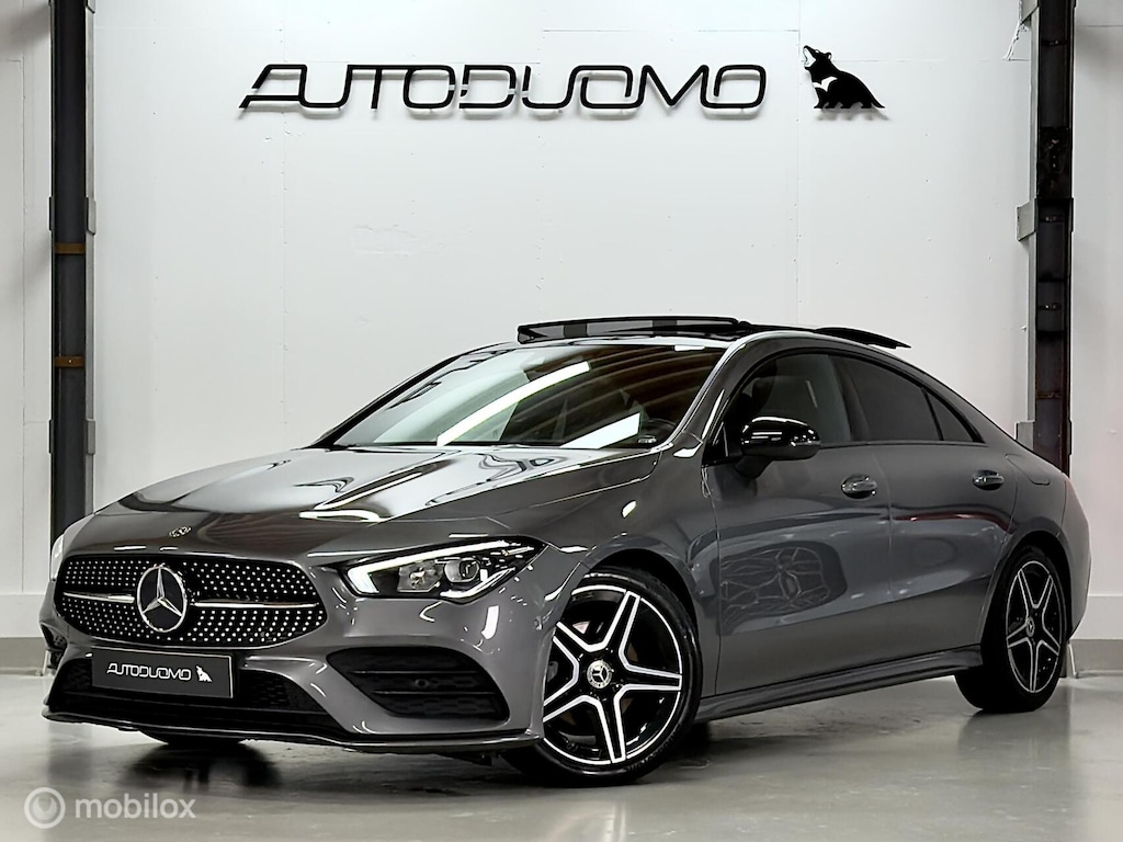 Mercedes-Benz CLA 180 AMG | Pano | Stoelverwarming | Sfeer | Night | 18" | LED HP | NAP | Camera | Leer | Verkeerslichtweergave+ | Widescreen | DYNAMIC
