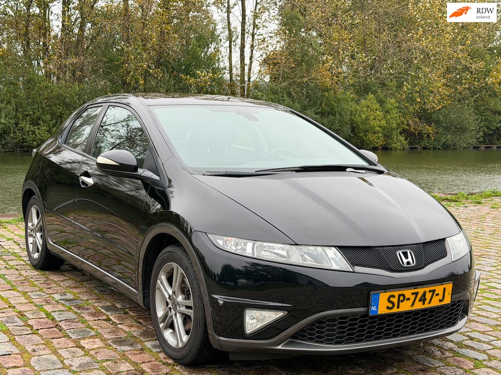 Honda Civic 1.4 Sport 2e eigenaar dealer onderhouden airco elektrische ramen cruise control parkeersensoren