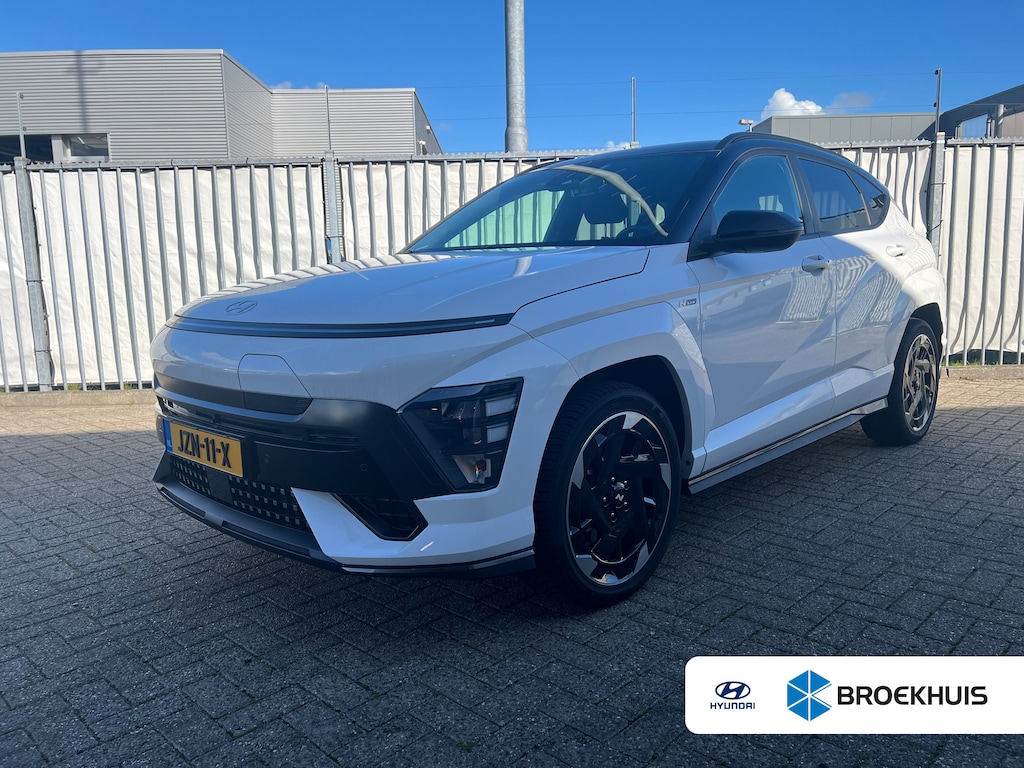 Hyundai Kona Electric 64.8 kWh 217pk N-Line Business | Carplay | Premium audio | Adaptive cruise controle | Dodehoek detectie | Keyless | Navigatie | Parkeersensoren | Camera | Stoelverwarming | Stuurverwarming | Warmtepomp