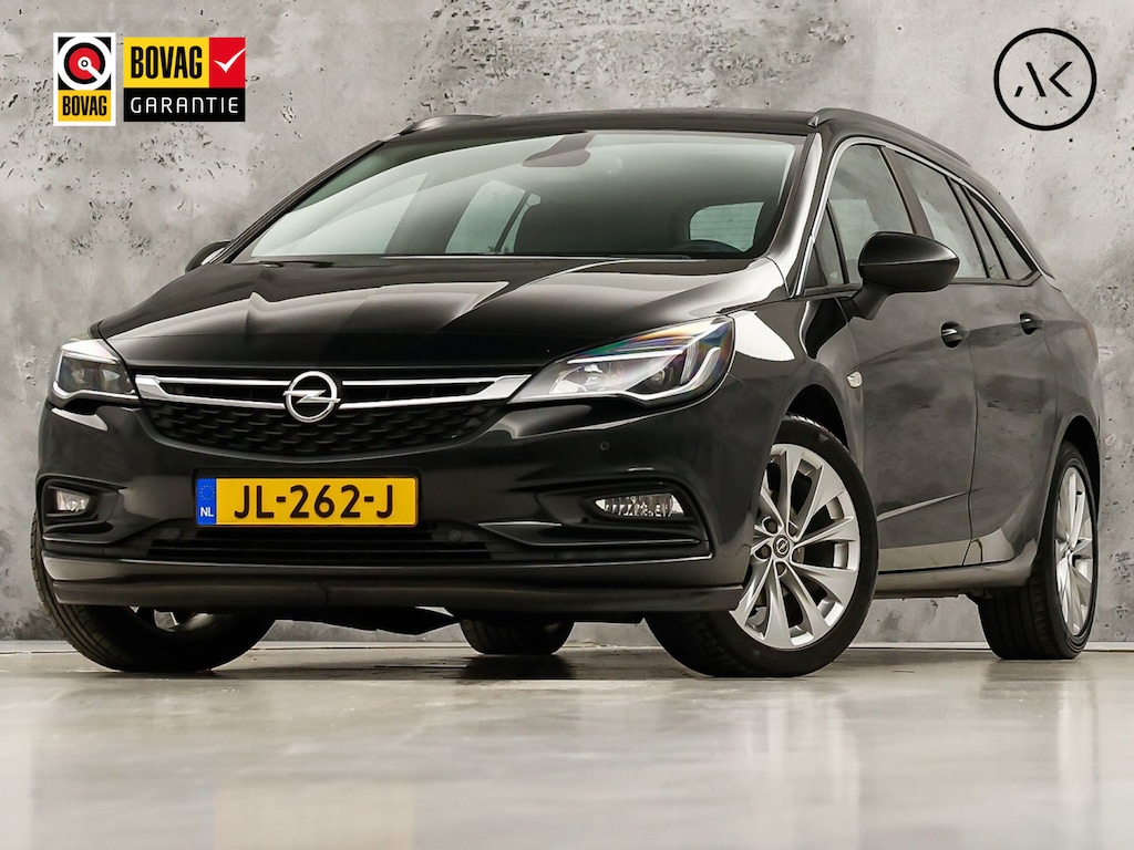 Opel Astra Sports Tourer 1.0 Edition (SCHUIFDAK, APPLE CARPLAY, GROOT NAVI, CLIMATE, TREKHAAK, SPORTSTOELEN, CRUISE, LM VELGEN, NIEUWSTAAT)