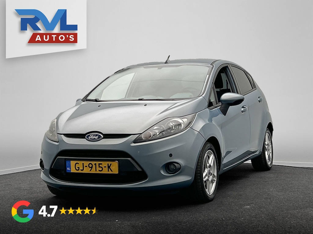 Ford Fiesta 1.4 Ghia Automaat | Lichtmetaal | Airco | Cruise-control | PDC |