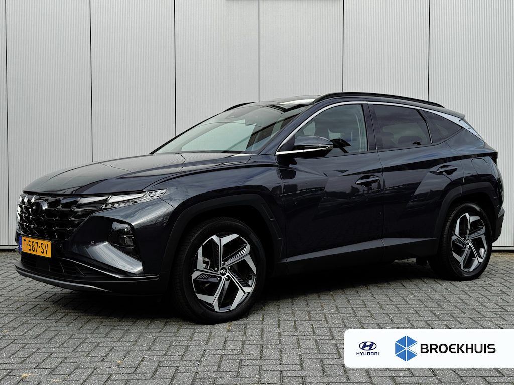 Hyundai Tucson 1.6 T-GDI 265pk PHEV Comfort Smart 4WD | Climate | Camera | Carplay | Keyless | Navigatie | Full - Led | Elek. Klep | Winterpakket | 19" Lichtmetaal | Krell Audio | Digitale Cockpit | Parkeer Assistent | Adapt. Cruisecontrol