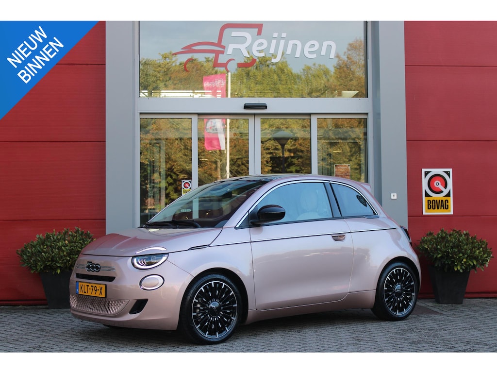 Fiat 500 1.0 Hybrid La Prima | PANORAMADAK | DRAADLOZE APPLE CARPLAY/ANDROID AUTO | DRAADLOZE TELEFOONLADER | LEDER BEKLEDING | ACHTERUITRIJ CAMERA | PARKEERSESOREN ACHTER | 17" LICHTMETALEN VELGEN DIAMOND CUT | ROSE GOLD | JBL PREMIUM AUDIO | DAB+ RADIO | LED KOPLAMPEN "INFINITY" | CLIMATE CONTROL | REGEN/LICHT SENSOR | KEYLESS START | | CRUISE CONTROL |