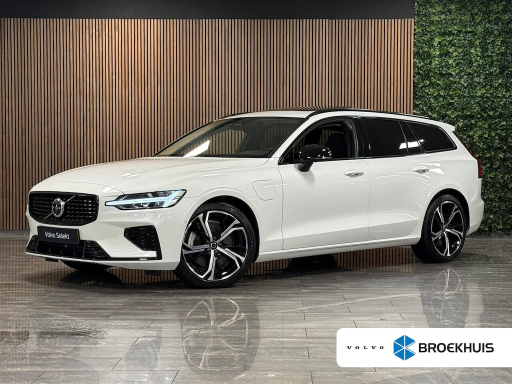 Volvo V60 T8 AWD Recharge Ultra Dark | Trekhaak | 360 Camera | Schuifdak | 455pk | Crystal White | Head-Up Display | Harman Kardon | Adaptieve Cruise Control | Stoelverwarming voor+achter | Stuurwielverwarming | 19 Inch | Full LED Meesturende koplampen | Pilot Assist | BLIS Dode Hoek Detectie | Elektrische voorstoelen geheugen | Lederen bekleding | Zitting verlenging voorstoelen | Lederen dashboard | Google Infotainment | Keyless Drive | Parkeersensoren voor+achter | Privacy Glass | Elektrisch bedienbare achterklep | DAB Radio | Apple Carplay/Android Auto | Volvo On Call met mobiele App functie | Crystal White Metallic |