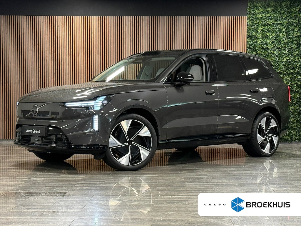 Volvo EX90 Twin Motor Performance Ultra 7p. 111 kWh | Full Option! | Bowers & Wilkins | Luchtvering | Trekhaak | 360° 3D Camera | Stoelmassage | Head-Up Display | 22 Inch | 517pk | Stoelventilatie | Adaptieve Cruise Control | Stoelverwarming voor+achter | Stuurwielverwarming | HD Pixel LED Koplampen Adaptief | Pilot Assist | BLIS Dode Hoek Detectie | Panorama dak | Elektrische voorstoelen met geheugen | Cardamom Dawn bekleding | Lederlook dashboard | Zitting verlenging voorstoelen | Geluidwerende/gelamineerde ramen | Soft Close portieren | Google infotainment | Warmtepomp | Geïntegreerd kinderzitje achterin | Keyless Drive | Parkeersensoren voor+achter | Elektrisch bedienbare achterklep | 7-Persoons | 4-Zone Climate Control | Apple Carplay/Android Auto | Volvo On Call met mobiele App functie | Platinum Grey Metallic