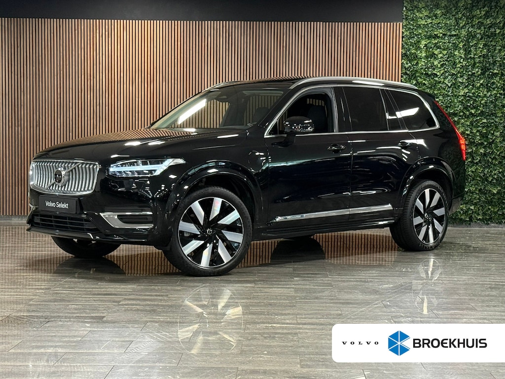 Volvo XC90 T8 AWD Recharge Plus Bright | Trekhaak | 360 Camera | Harman Kardon | 455pk | Adaptieve Cruise Control | Stoelverwarming voor+achter | Stuurwielverwarming | Schuifdak | Full LED Meesturende koplampen | Pilot Assist | BLIS Dode Hoek Detectie | Elektrische voorstoelen geheugen | Lederen bekleding | Zitting verlenging voorstoelen | Lederen dashboard | 21 Inch | Google Infotainment | Keyless Drive | Privacy Glass | Elektrisch bedienbare achterklep | Geïntegreerd kinderzitje achterin | Geïntegreerde zongordijnen achterportieren | Verlichte instaplijsten | 7-Persoons | 4-Zone Climate Control | DAB Radio | Apple Carplay/Android Auto | Onyx Black Metallic |
