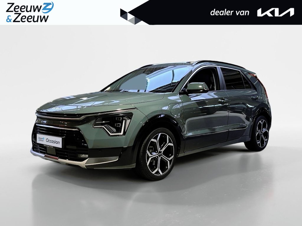 Kia Niro Hybrid 1.6 GDi PHEV DynamicPlusLine | Apple Carplay / Android Auto | Navigatiesysteem | Stoel + Stuurverwarming | Elektrisch Schuif / Kanteldak | Licht + Regensensor | Parkeersensoren Voor + Achter | ParkeerCamera Achter | Elektrisch Bedienbare Achterklep | 18” Lichtmetalen Velgen | Cruise Control Adaptief | Rijstrooksensor + Correctie