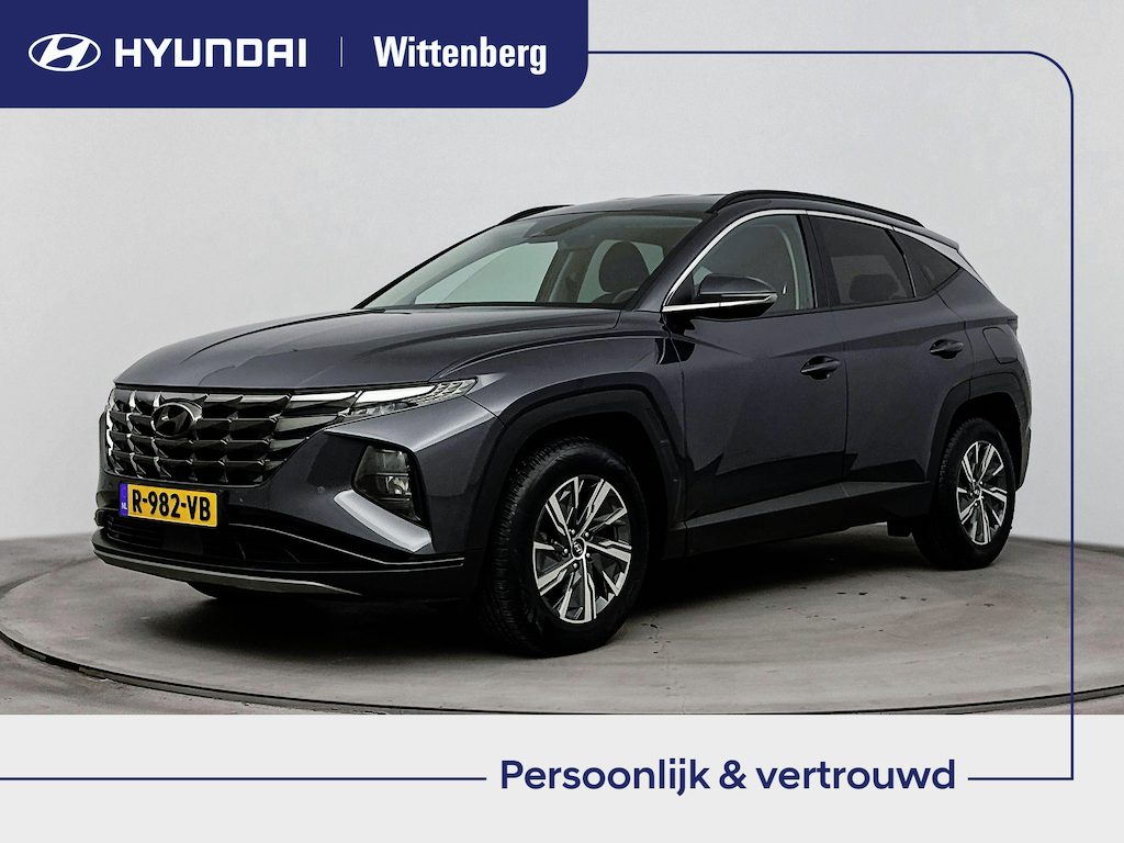 Hyundai Tucson 1.6 T-GDI HEV Comfort Smart | Stoel + stuurverwarming | El. bed. achterklep | All Season | Adaptive cruise | Dodehoek | Apple Carplay |