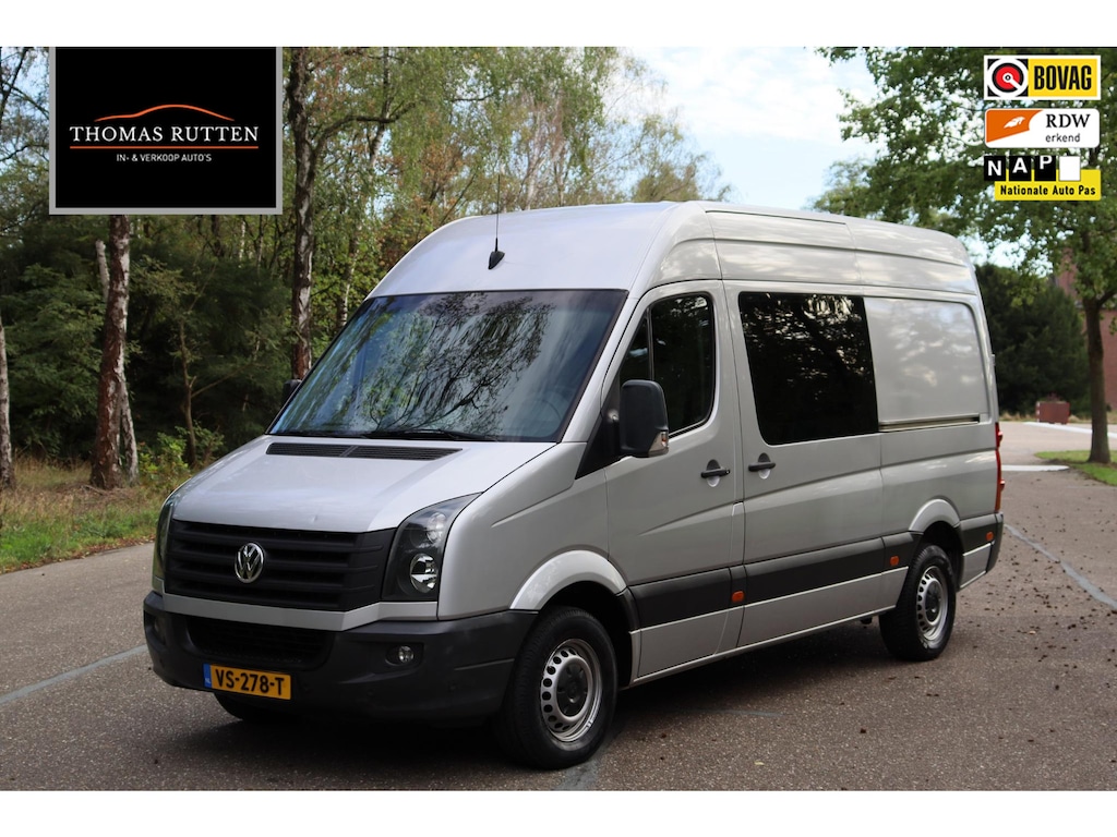 Volkswagen Crafter 32 2.0 TDI L2H2 DC 2016 | Trekhaak | Airco | Navigatie | Cruise Control | Achteruitrij Camera | Stuurwiel Multifunctioneel | Dubbele Schuifdeur | Stoelverwarming | Boekjes | 2 Sleutels | Nationale Autopas NAP