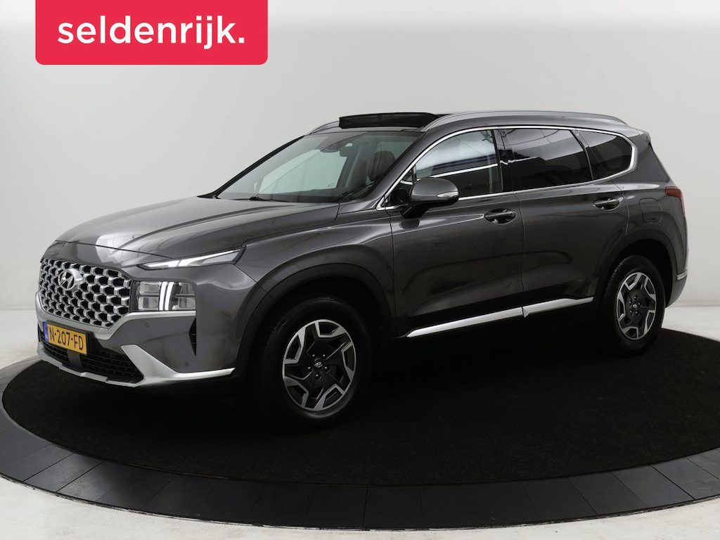Hyundai Santa Fe 1.6 T-GDI HEV Comfort Smart Sky 7p. | Panoramadak | Leder | Adaptive cruise | Dodehoek detectie | Stoelverwarming | KRELL Sound | Trekhaak | Camera | Park assist | Carplay