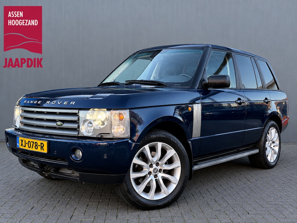 Land Rover Range Rover BWJ 2003 4.4 V8 286 PK Vogue AUTOMAAT / NW APK! TREKHAAK / 2 TONE LEDER / SCHUIF PANODAK / MEMORY STOELEN / STOEL + STUUR VERW. / ACHTERBANK VERW. / PDC / LMV / NAVI / CLIMA / CRUISE