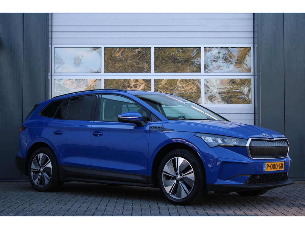 Skoda Enyaq iV 60 SOH 89% Clima/Cruise/PDC/Carplay/Android/Lane.Assist/LED/Navi/HalfLeder/DAB/19"LM/Trekhaak/APK:24-03-2028