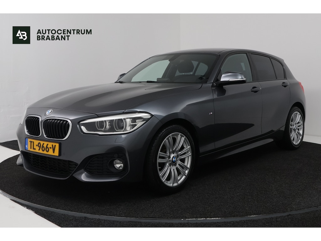 BMW 1-Serie 118i High Executive (STOELVERWARMING, CRUISE CONTROL, NAVIGATIE, PARKEERSENSOREN, DEALER ONDERHOUDEN)