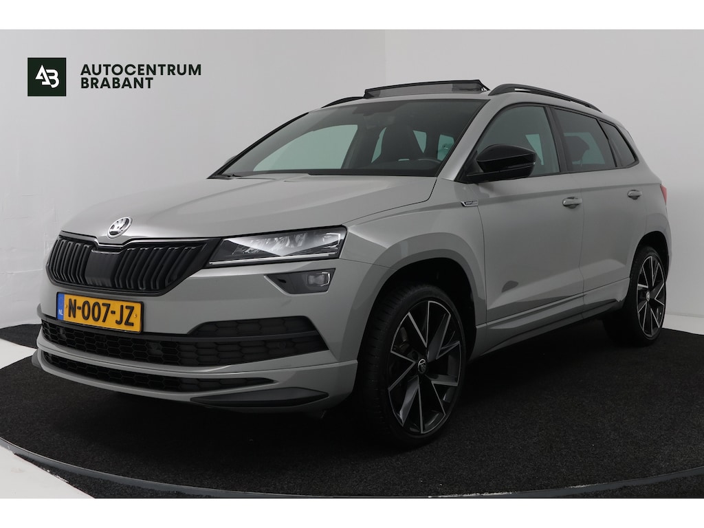 Skoda Karoq 1.5 TSI ACT Sportline Business (PANORAMADAK, TREKHAAK, STOEL/STUUR VERWARMING, CAMERA)