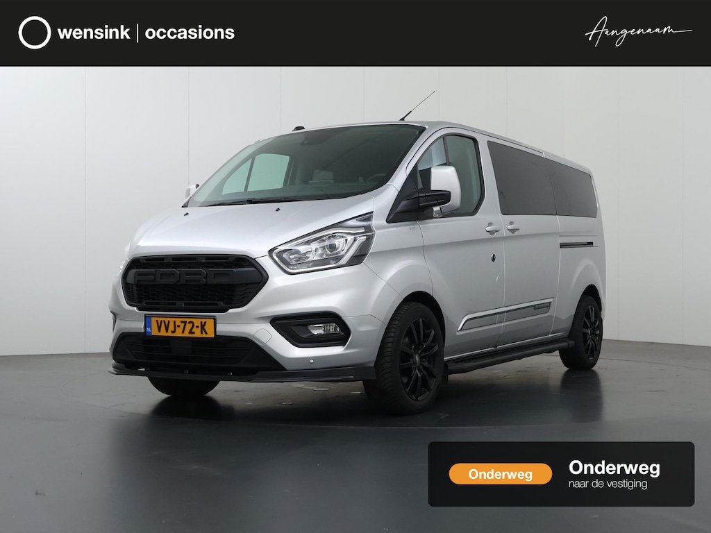 Ford Transit Custom 320 2.0 TDCI | AUT. | PLATINUM | DUBBELE CABINE | 2X ZIJSCHUIFDEUR | LEDEREN BEKLEDING | PARKEERCAMERA | NAVIGATIE | 18" VELGEN | STOELVERWARMING | LEREN BEKLEDING | TREKHAAK | PARKEERSENSOREN