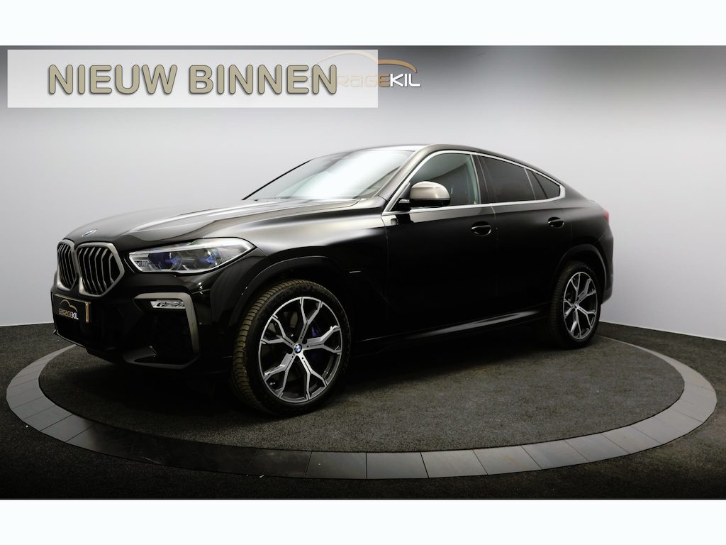 BMW X6 M50i High Executive Orig. NL / 360 Camera / Leder dash. / Achteras best. / Merino / 21'' LM velgen / M-Sport / Adap. cruise / Head Up / Laser / Safety Pack /