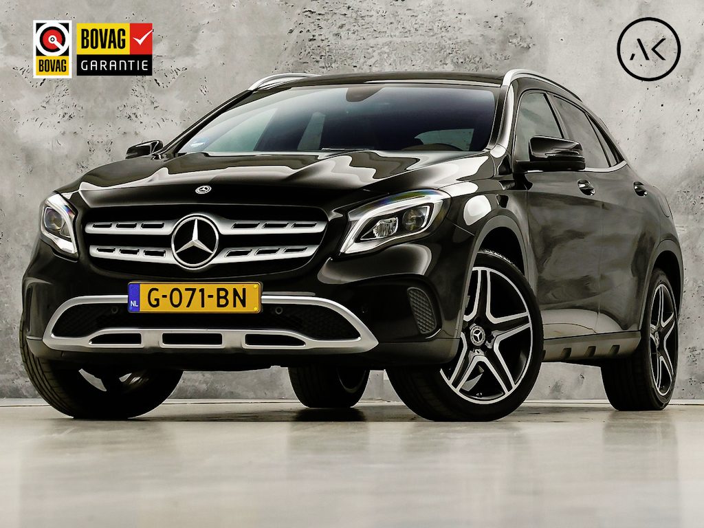 Mercedes-Benz GLA 250 4Matic Premium AMG Sport 211Pk Automaat (PANORAMADAK, MEMORY SEATS, GROOT NAVI, CAMERA, TREKHAAK, SPORTSTOELEN, GETINT GLAS, BRUIN LEDER, STOELVERWARMING, NIEUWSTAAT)