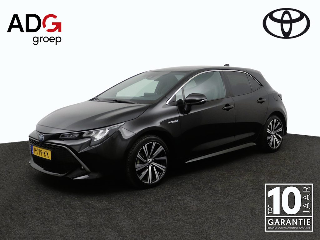 Toyota Corolla 1.8 Hybrid Dynamic | Stoelverwarming | Keyless | Leder-stof bekleding | Trekhaak |