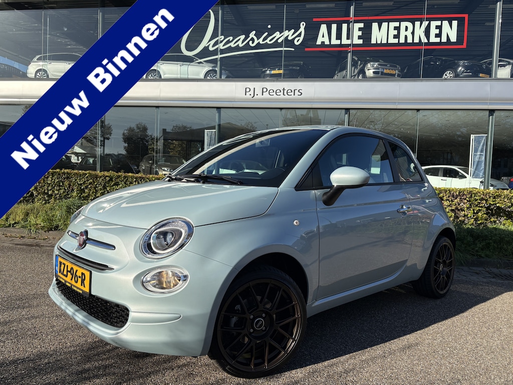 Fiat 500 1.0 Hybrid Dolce vita Airco - Apple carplay - Navigatie - Licht metalen velgen 17 inch - Bluetooth - Cruise control - Stuur multifunctioneel - Start/ stop systeem - Led verlichting - Elektrische ramen - Centrale vergrendeling met afstandsbediening
