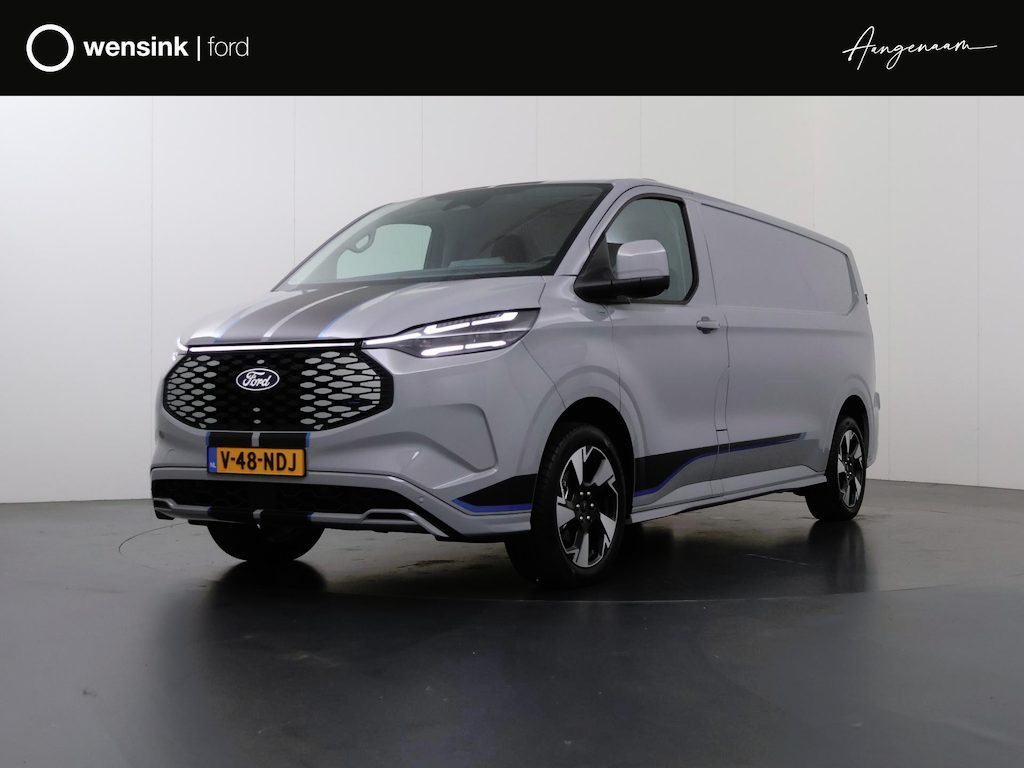 Ford E-Transit Custom 320 | L2 H1 | SPORT | 65 kWh | 301 KM RANGE WLTP | 2-ZITS | ADAPTIVE CRUISE CONTROL | LM VELGEN | SPOILER | PARKEERCAMERA | NAVIGATIE |