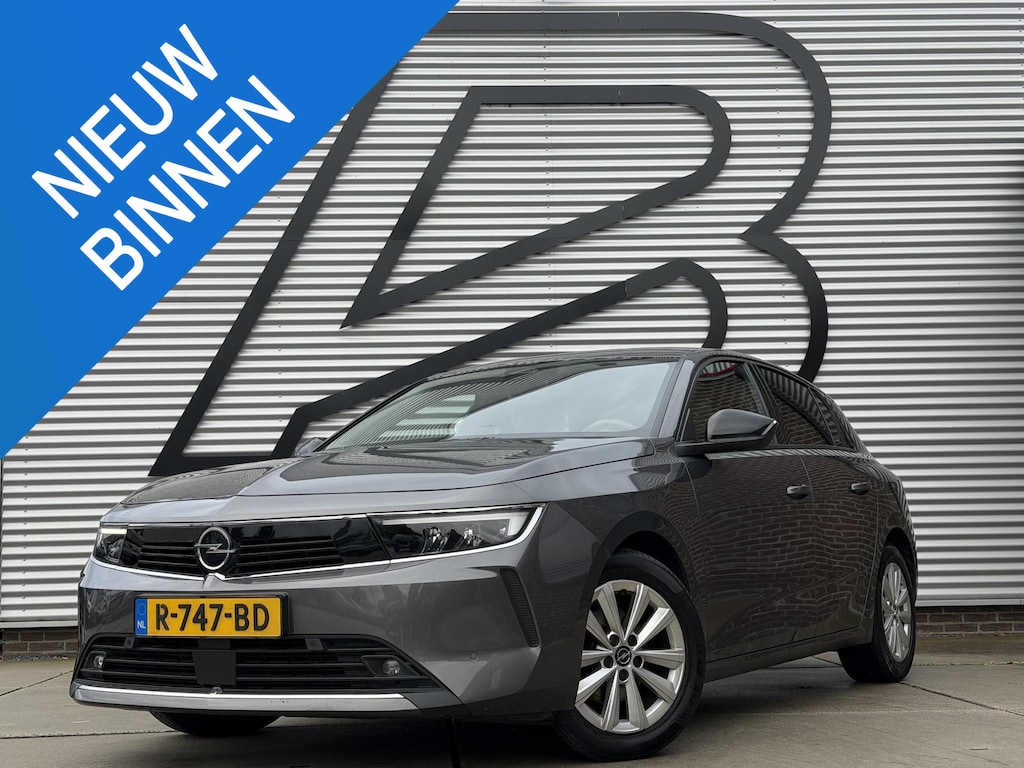 Opel Astra 1.2 Business Edition 2e Eigenaar|Navi|Carplay|D-riem vv in 2026|360 Camera|Clima|Cruise|Stoleverwarming|N.A.P|APK tot 07-2028