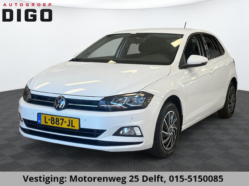 Volkswagen Polo 1.0 TSI COMFORTLINE NAVIGATIE GARANTIE 2031* PDC VOOR EN ACHTER . DRAADLOOS TELEFOONOPLADER .