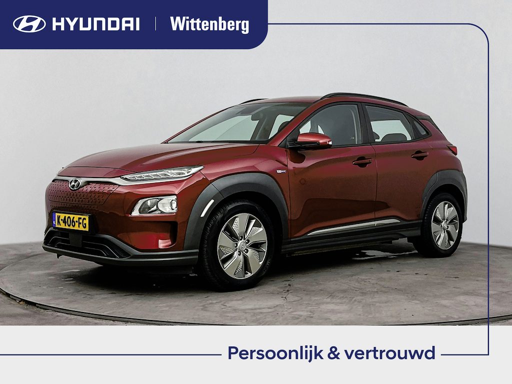 Hyundai Kona Electric EV COMFORT 64 kWh | PDC | 3 FASE | WARMTEPOMP | CAMERA | CLIMA | CRUISE ADAPT. | NAVI | PRIVACY GLASS | DAKRAILING | APPLE CAR PLAY & ADROID AUTO |