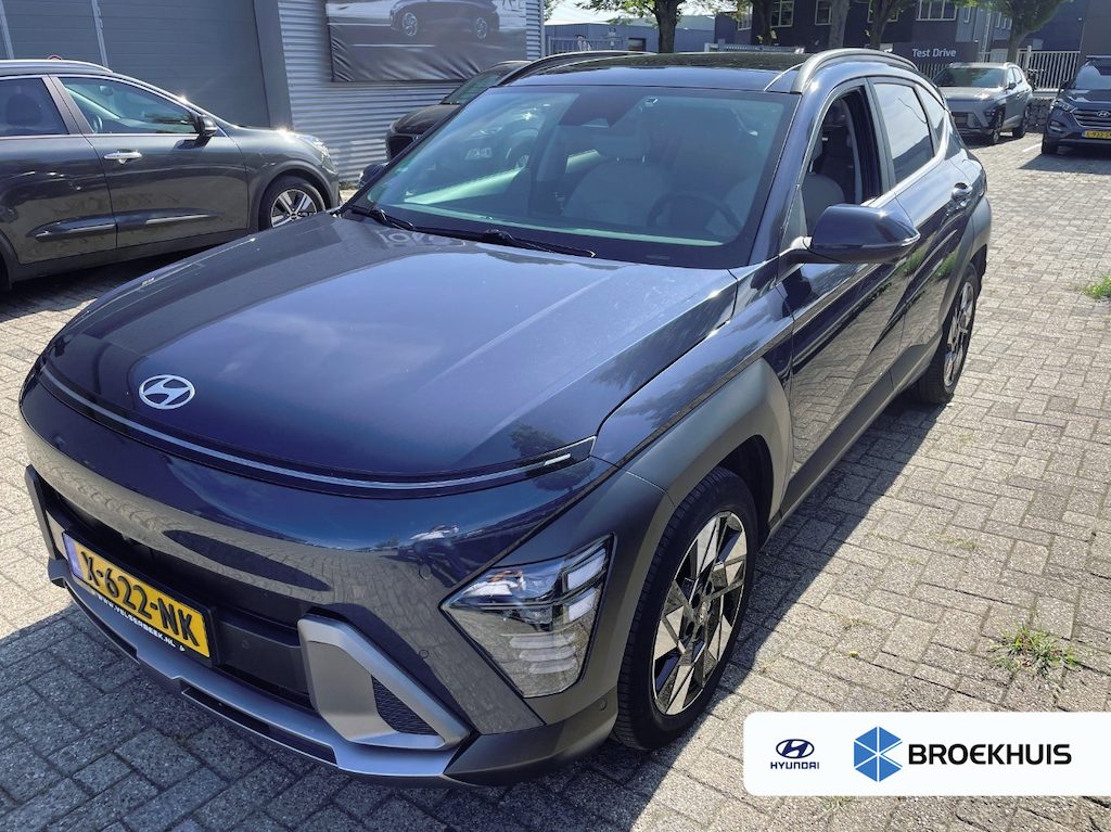 Hyundai Kona 1.6 GDI HEV 141pk Premium Sky | Afn. Trekhaak | Schuif-kanteldak | Leder | Stoelgeheugen | Stoelventilatie | 360 Camera | Dodehoek | Bose