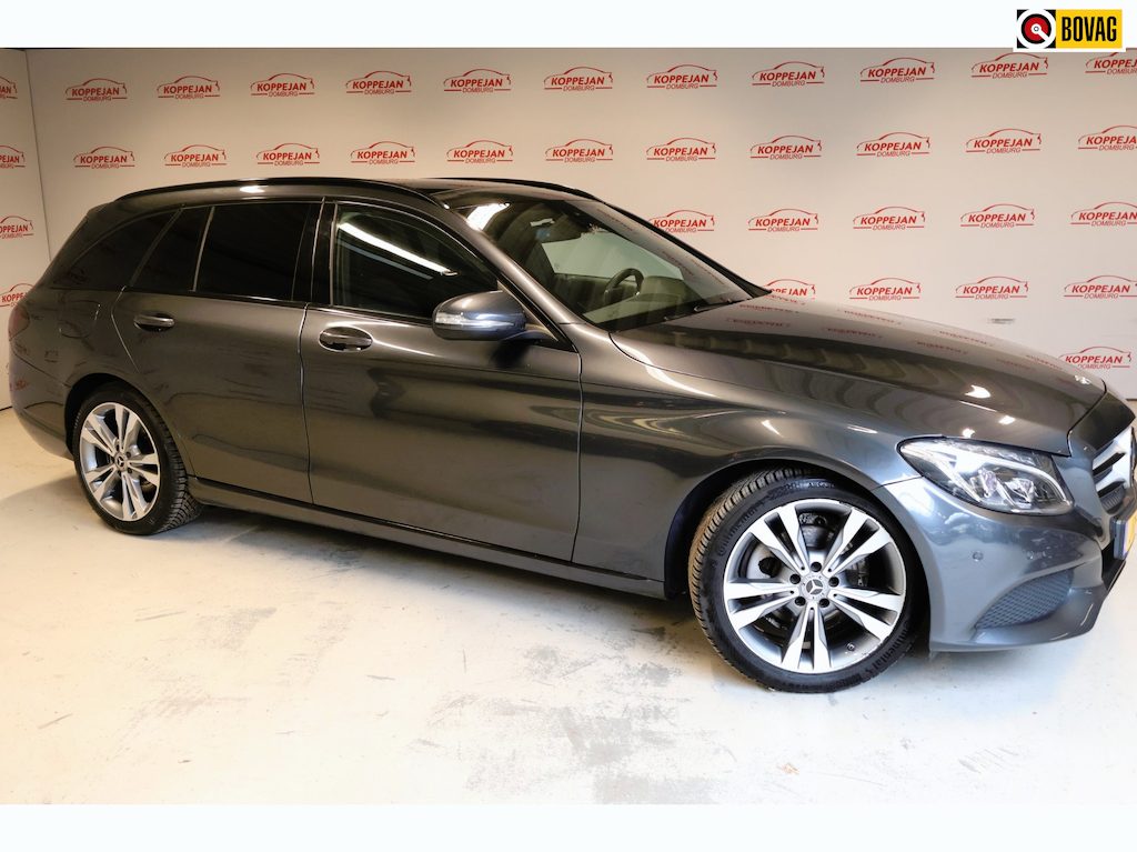 Mercedes-Benz C-klasse Estate 180 Ambition NL Auto|Trekhaak|Panoramadak|Stoelverwarming|All Season Banden|Bluetooth Streaming|