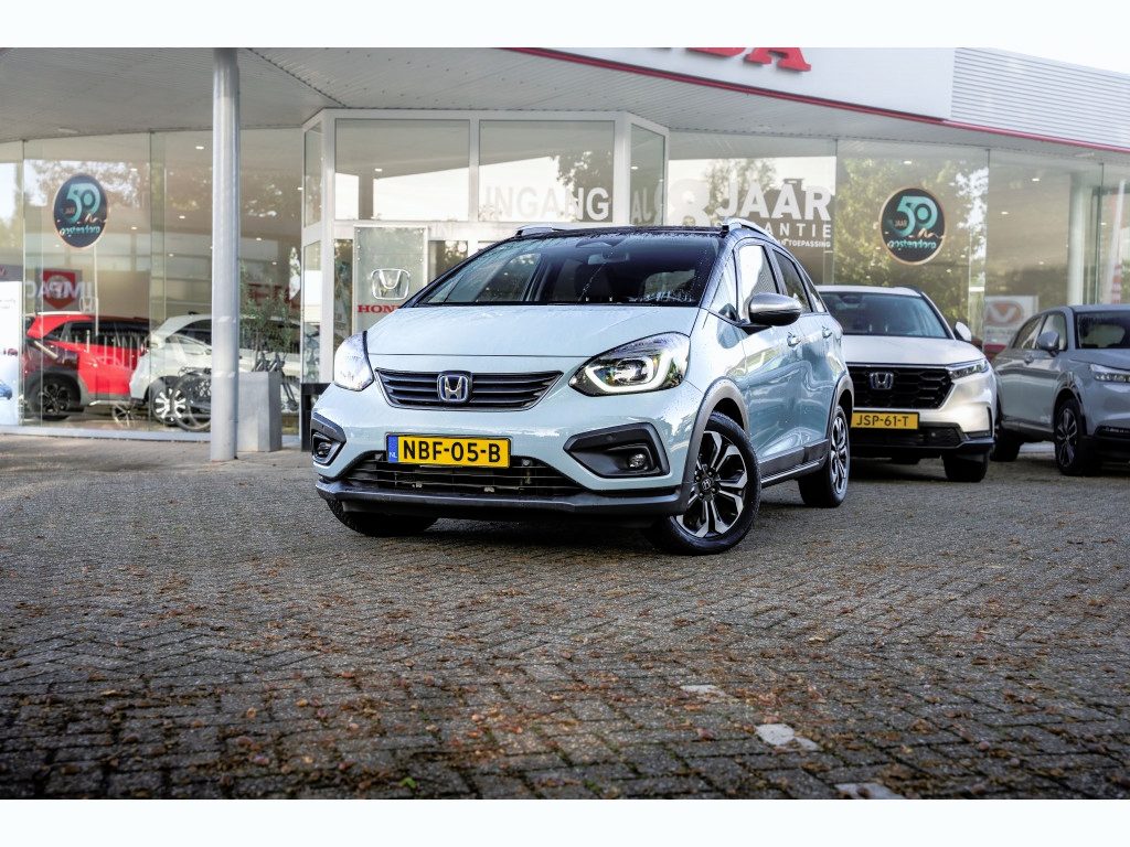 Honda Jazz 1.5 i-MMD 109pk Hybrid CVT Crosstar Automaat | Bi-Tone Surf Blue | Volledig onderhouden | Navigatie | PDC v/a | Camera | Carplay / Android