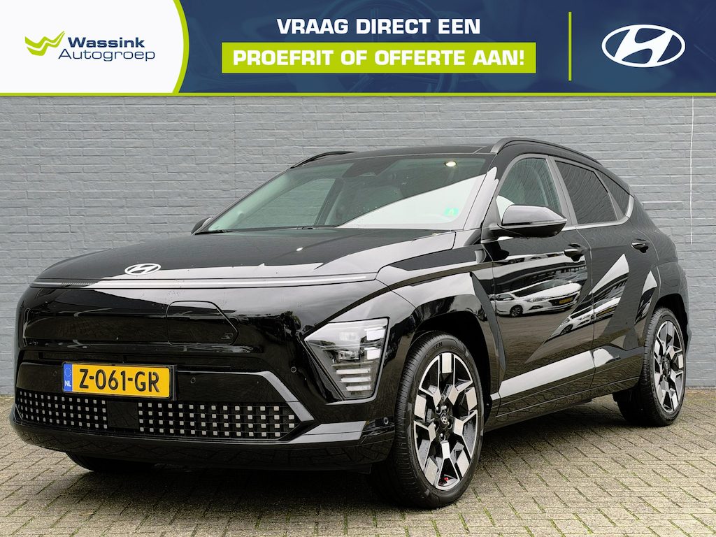 Hyundai Kona Electric Premium Sky 65.4 kWh | SOH 98% | Schuif-Kanteldak | Wit Lederen Bekleding | Stoelventilatie | Stoel & Stuurverwarming | 360 Camera | Parkeersensoren Voor & Achter