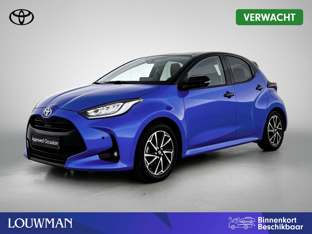 Toyota Yaris 1.5 Hybrid Business Plus | Blauw Gewrapt | Head-Up Display | Dodehoek detectie | Parkeersensoren voor+achter | Navigatie | Climate Control | Draadloze telefoonlader | Achteruitrijcamera |