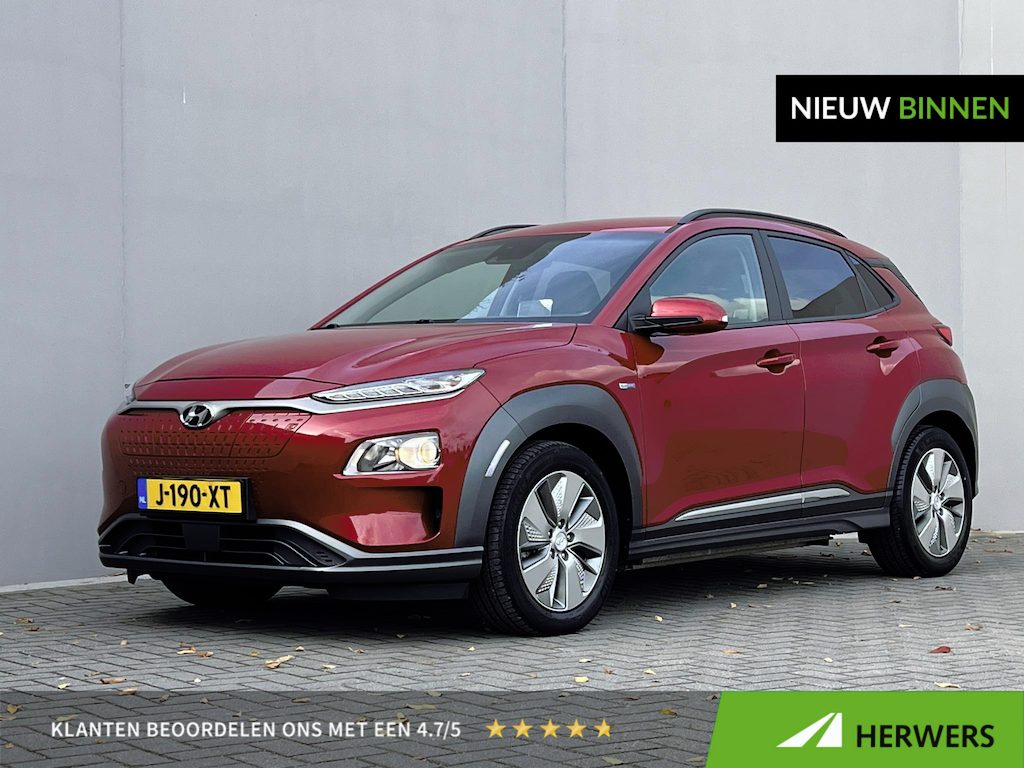 Hyundai Kona Electric EV Fashion Design 39 kWh / Dealer onderhouden / Accu SoH 98,6 % / HUD / Warmtepomp / CCS snel laden / Camera / Navigatie / Krell audio / 17" LM wielen /