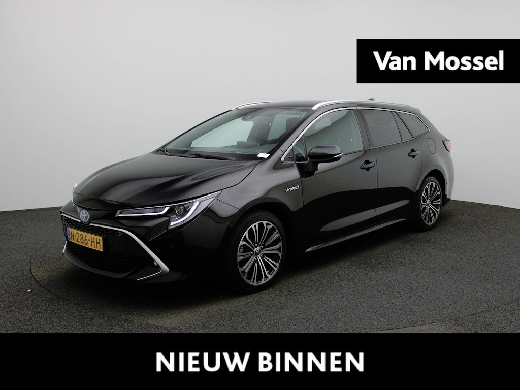 Toyota Corolla Touring Sports 1.8 Hybrid Executive | Automaat | Stoel verwarming | Parkeer sensoren | DAB  | Camera | Climate control | Cruise control | Bluetooth | Half Leder