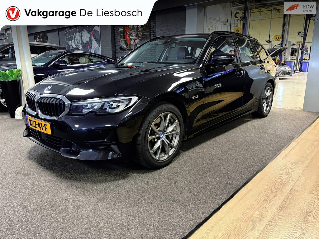 BMW 3-Serie Touring 330e Business Edition Plus / trekhaak / sportstoelen / cruise